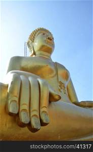 Golden Buddha statue of Big Buddha over blue sky ,Pattaya Thailand