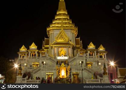 Golden Buddha Temple at night. Decorative lighting to make it look colorful.