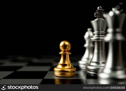 Golden Chess pawn standing in front of other chess, Concept of a leader must have courage and challenge in the competition, leadership and business vision for a win in business games
