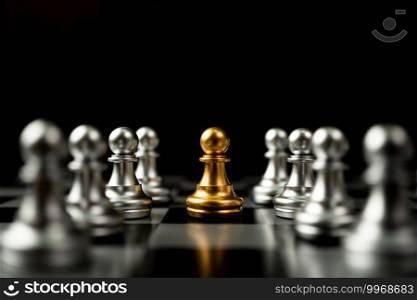 Golden Chess pawn standing to Be around of other chess, Concept of a leader must have courage and challenge in the competition, leadership and business vision for a win in business games
