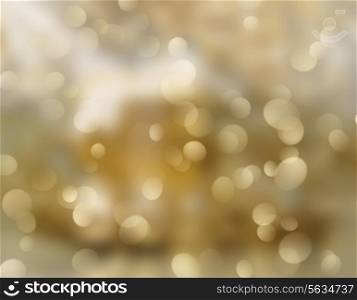 Golden Christmas background of blurred bokeh lights