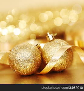 golden christmas ball on golden bokeh background