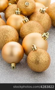 Golden christmas balls background.