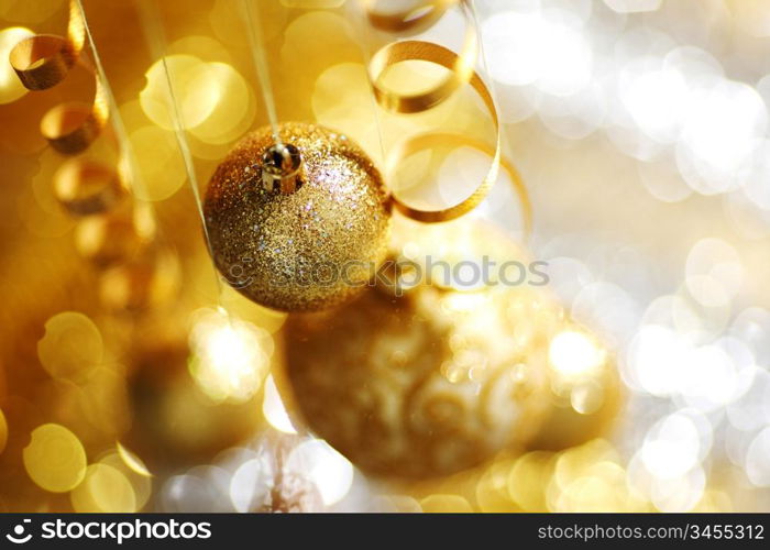 golden christmas balls on bokeh background