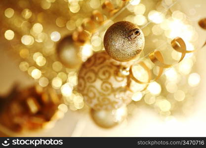 golden christmas balls on bokeh background