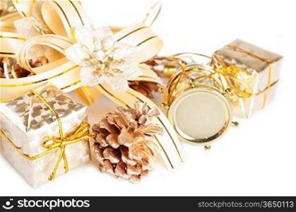 Golden Christmas decorations and gifts on a white background