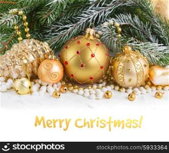 golden christmas decorations with evergreen tree border on white background. golden christmas decorations