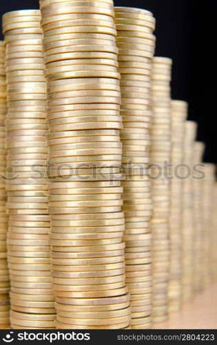 Golden coins in high stacks