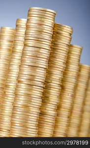 Golden coins in high stacks