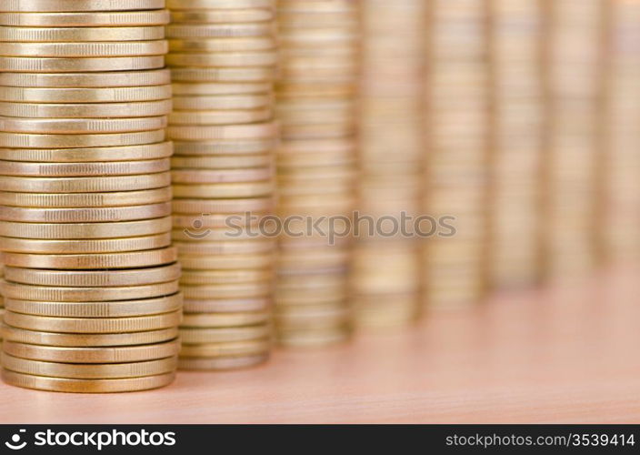 Golden coins in high stacks