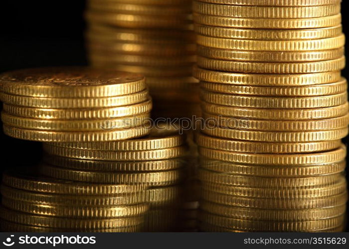 golden coins on black background