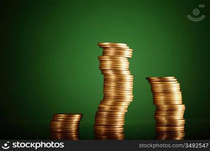 golden coins on green background