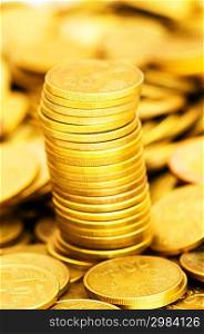 Golden coins stack - shallow depth of field