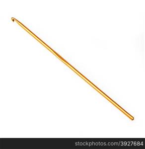 Golden crochet hook isolated on white.with clipping path