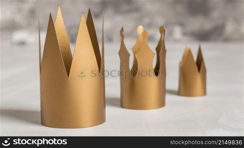 golden crowns blurred background