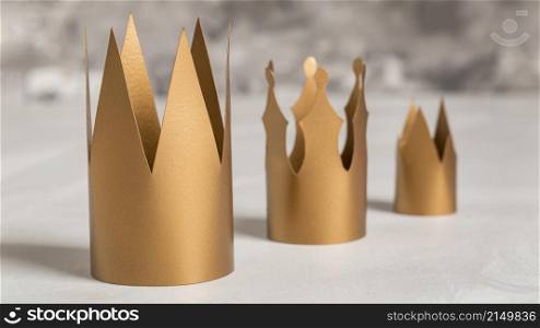 golden crowns blurred background