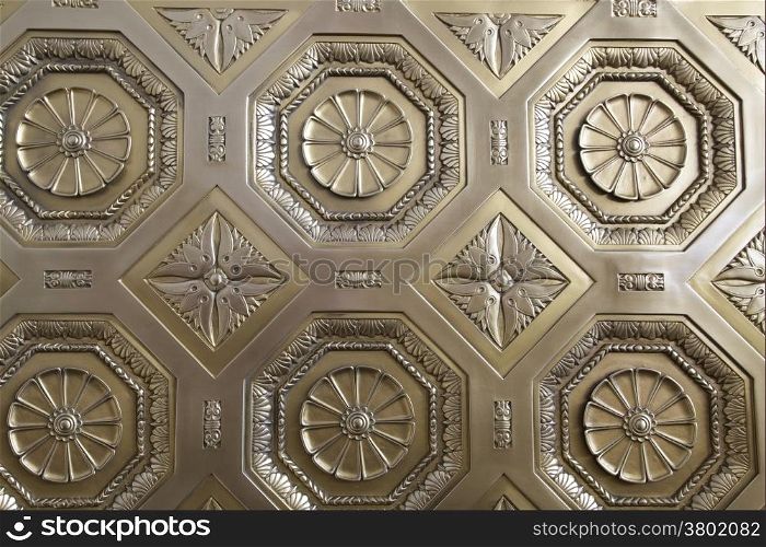 Golden decorative patterned door, Background
