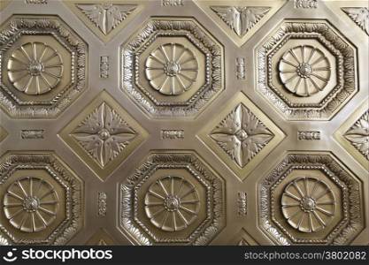 Golden decorative patterned door, Background