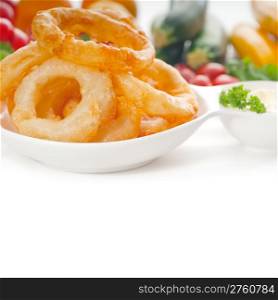 golden deep fried onion rings served with mayonnaise dip and fresh vegetables oln background ,MORE DELICIOUS FOOD ON PORTFOLIO