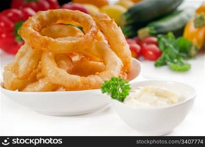 golden deep fried onion rings served with mayonnaise dip and fresh vegetables oln background ,MORE DELICIOUS FOOD ON PORTFOLIO