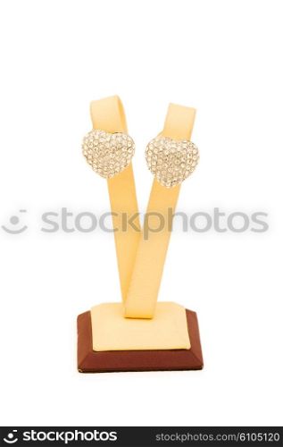 Golden earrings isolated on the white background