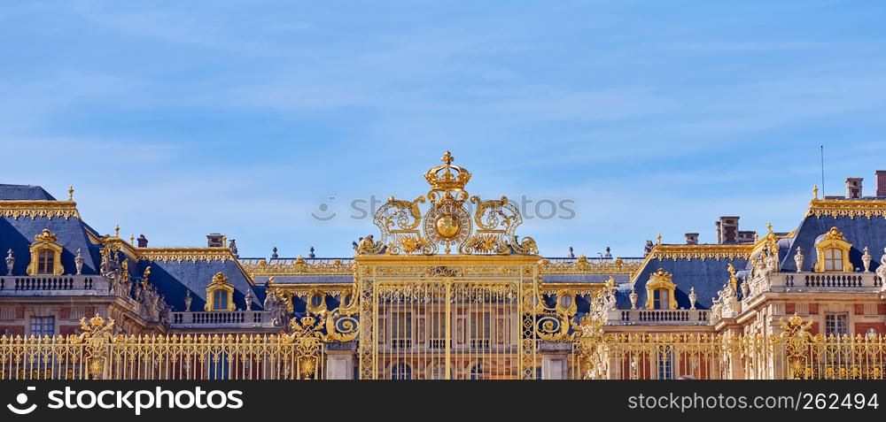 Golden Entrance Gates of the Palace of Versailles. Panoramic shot. Paris, France. Golden Entrance Gates