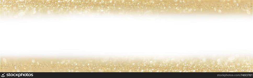 Golden festive glitter background with defocused lights , white copy space. Festive glitter background