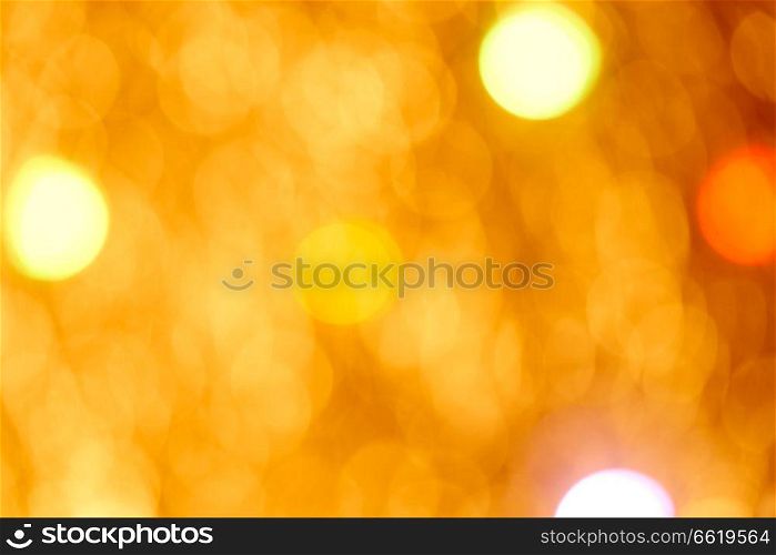 Golden flare lights blur abstract yellow background