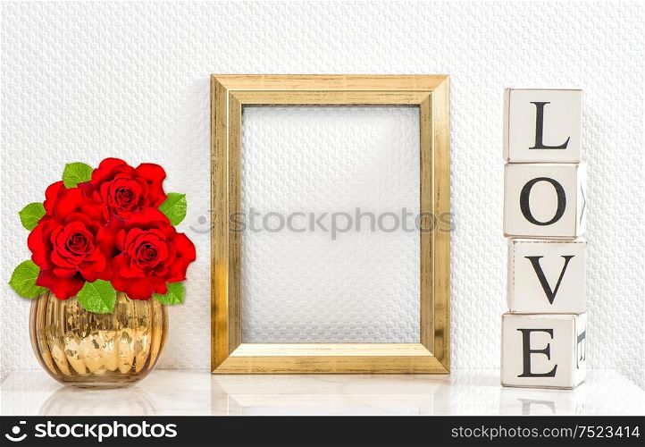 Golden frame and red roses. Mock up with space for your picture or text