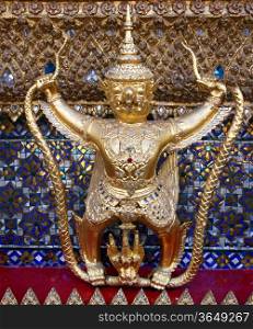 Golden Garuda bird ornamental at Wat Phra Keao Temple in Grand Palace, Bangkok Thailand