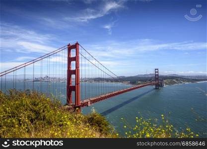 Golden Gate Bridge and San Francisco downtown in the sunny day