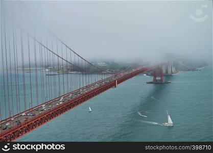 Golden Gate Bridge surrounded by fog, San Francisco.