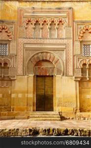 Golden Gate entrance to the La Mezquita - Catedral de Cordoba. Cordoba, Andalusia, Spain.