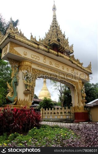 Golden gate of buddhist monasyery in Yangon, Myanmar