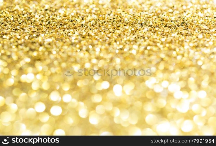 Golden glitter texture christmas background. Golden glitter texture christmas background with copy space
