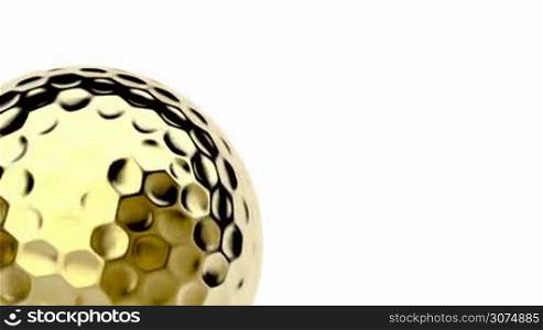 Golden golf ball spin on white background