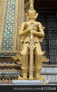 Golden guard in Grand palace, Bangkok, Thailand