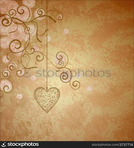 golden heart with flourishes hanging on grunge old paper background