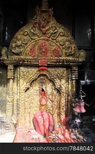 Golden hindu shrine in the temple in Bhaktapur