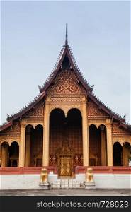 Golden historic Main hall with beautiful facade of Vatsensookharam temple - Luang Prabang, Laos
