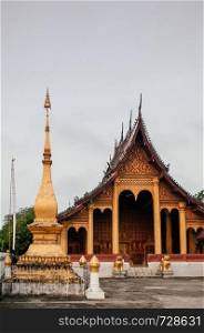 Golden historic Main hall with beautiful facade of Vatsensookharam temple - Luang Prabang, Laos