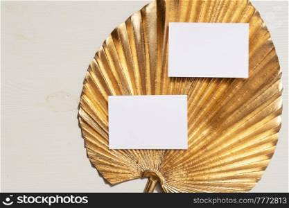 Golden leaves styled stock scene, template for wedding invitations or stylish presentation. Golden leaves styled stock scene