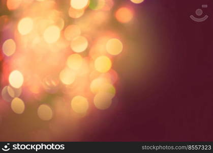 Golden light bokeh motion background. Gold glittering blur background. Holiday abstract background. Christmas gold background.