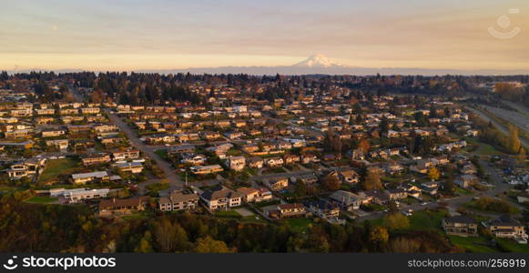 Golden light hits the homes here on clear afternoons at sunset in Tacoma