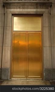 Golden metal doors in a building