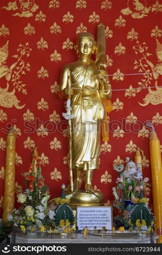 Golden monk in Wat Chedi Luang, Chiang Mai, Thailand