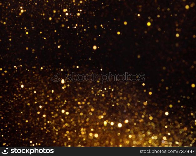 Golden overlay background of golden lights with bokeh effect. Includes copy space.