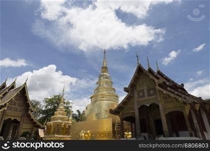 golden pagoda and sanctuary in buddhism temple