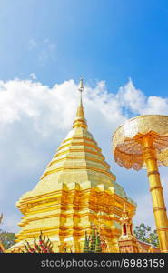 Golden pagoda and umbrella in Wat Phra That Doi Suthep is the popular tourist destination of Chiang Mai, Thailand.