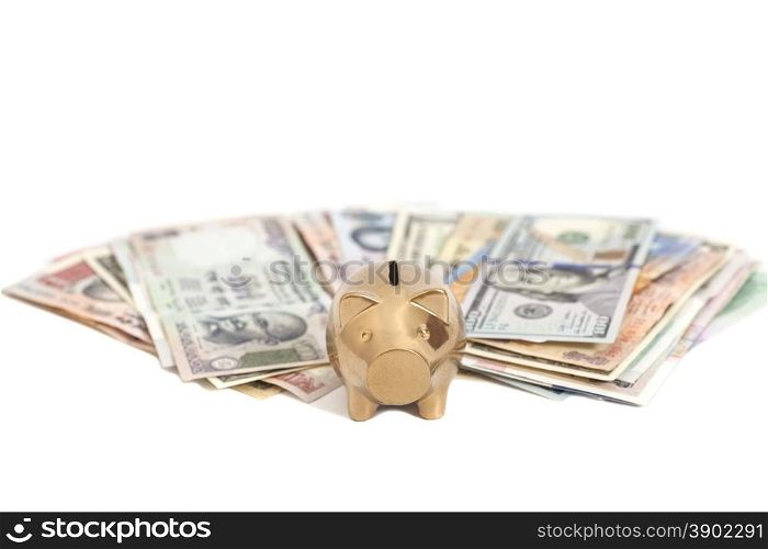 Golden piggy bank with International currencies isolated